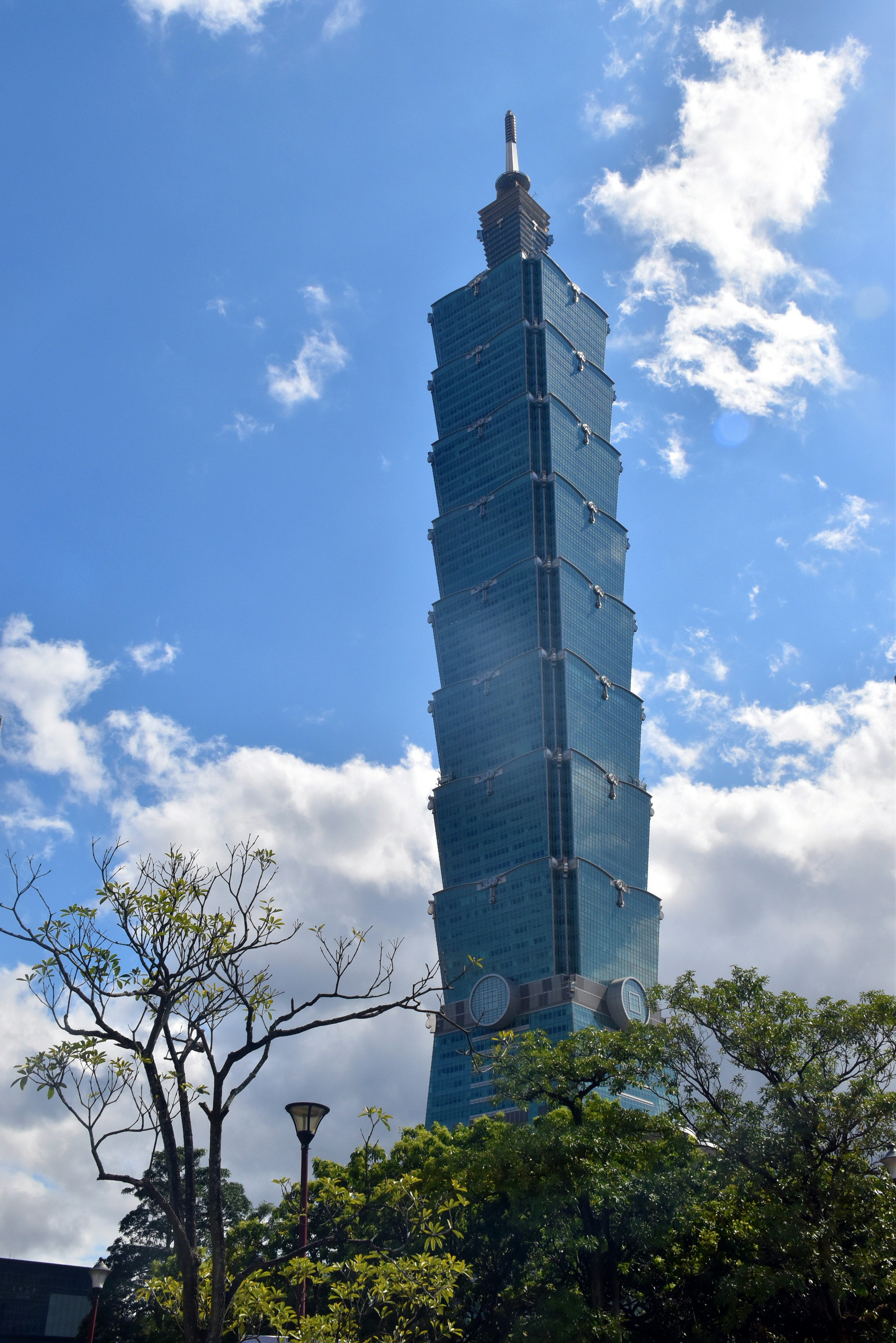 a tall building with a sky background