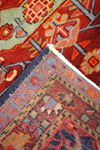 a close up of a rug with different colors