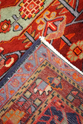 a close up of a rug with different colors
