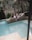 Couple relaxing at a lavish poolside resort.