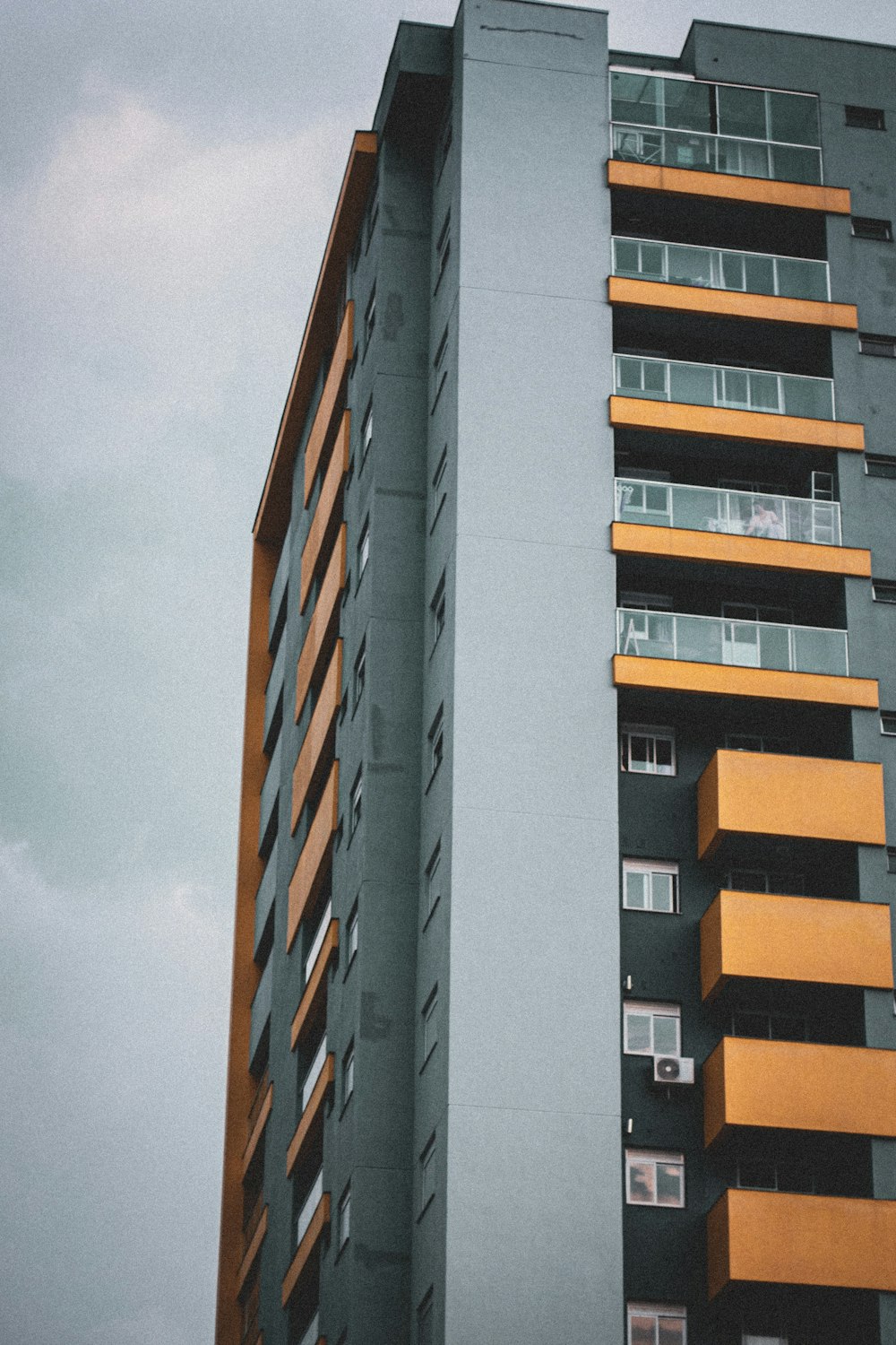 a tall building with balconies and balconies on it