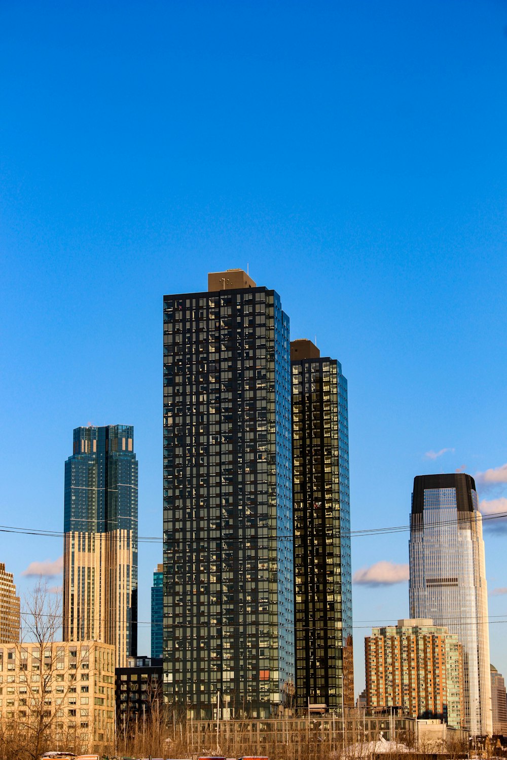 a group of tall buildings sitting next to each other