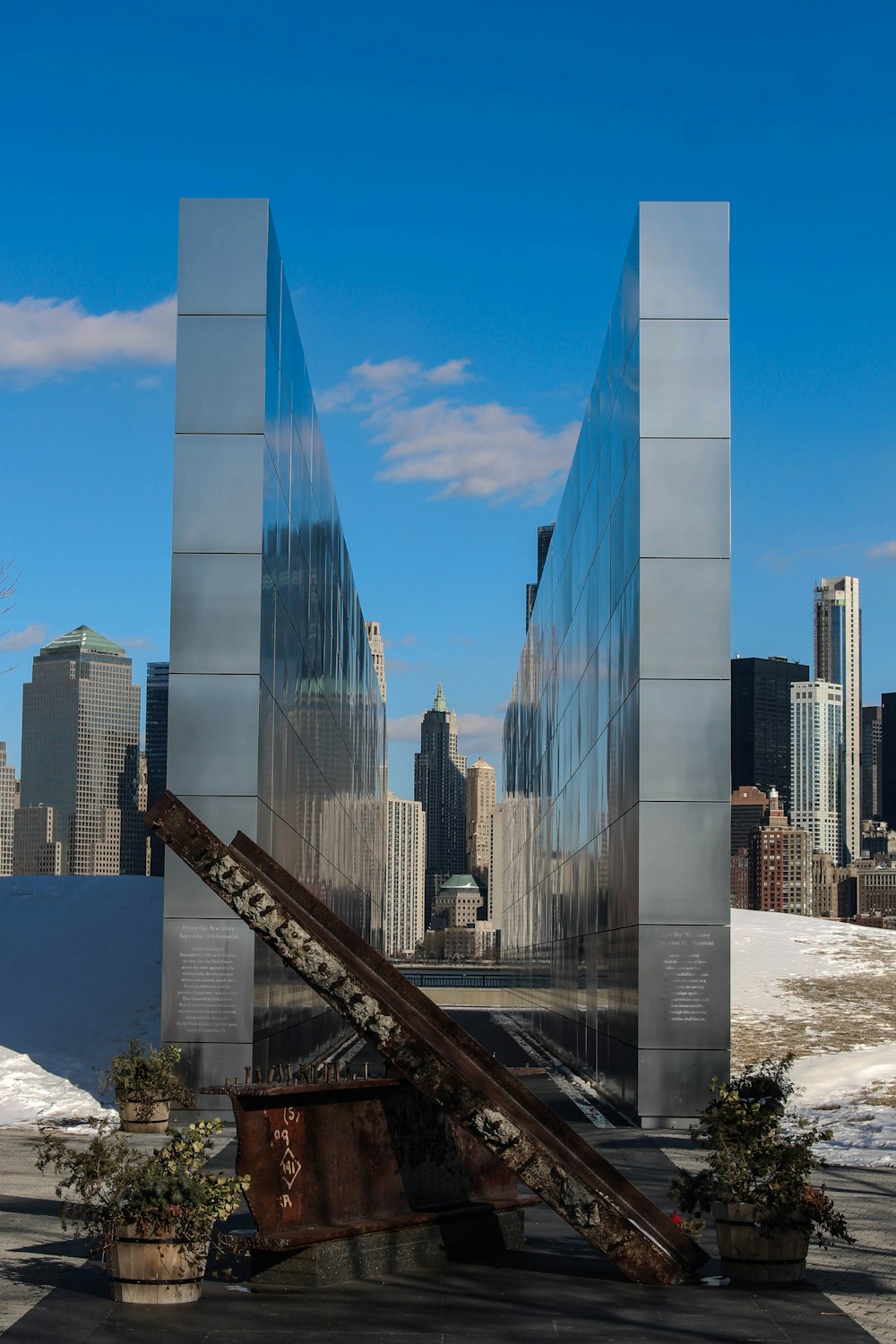 a very tall building with a very large metal structure in front of it