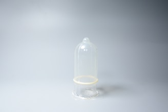 Close-up of ultra-thin latex condom packaging with subtle branding