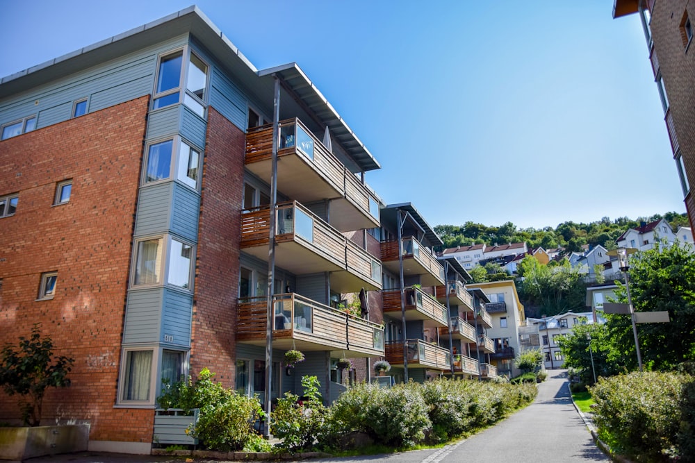 an apartment building with balconies and balconies on the balconies