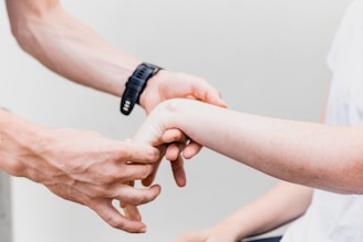 a couple of people that are holding hands