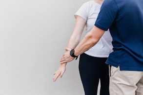 a man and a woman standing next to each other