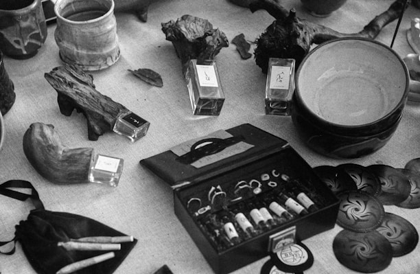 A neatly arranged nazar protection kit with traditional items on a simple wooden surface.