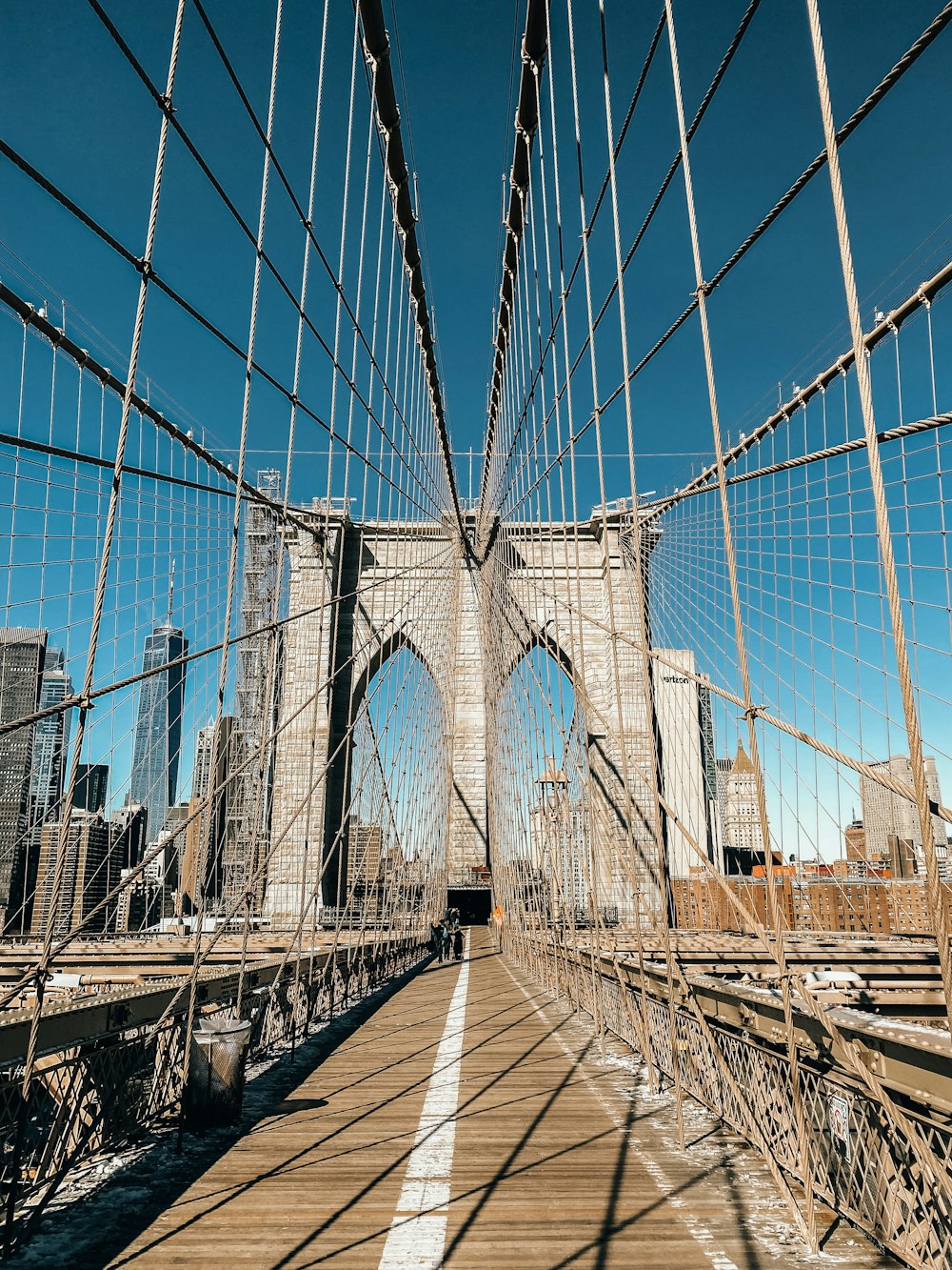 a view of the brooklyn bridge from across the river