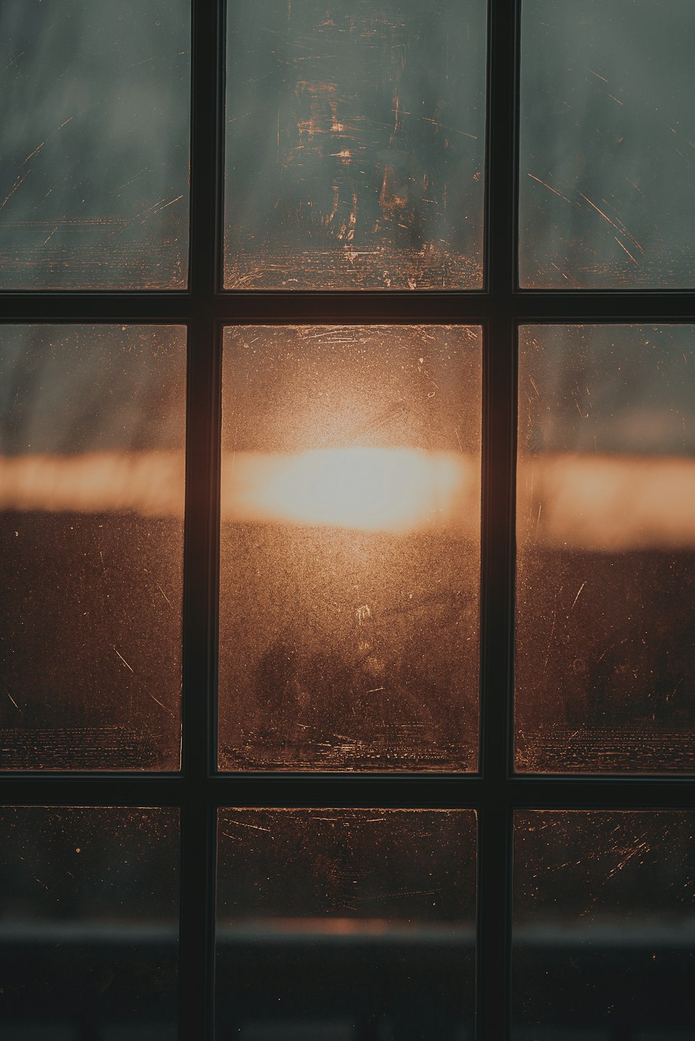 the sun is shining through the window of a building