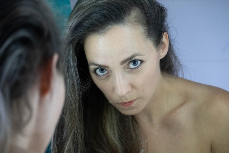MILF admiring her reflection