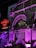 An exterior view of a historical building with a prominent arched window, illuminated in purple and pink lights. The sign for Hard Rock Cafe Bengaluru is brightly lit in red, attached to the stone façade with intricate architectural details.