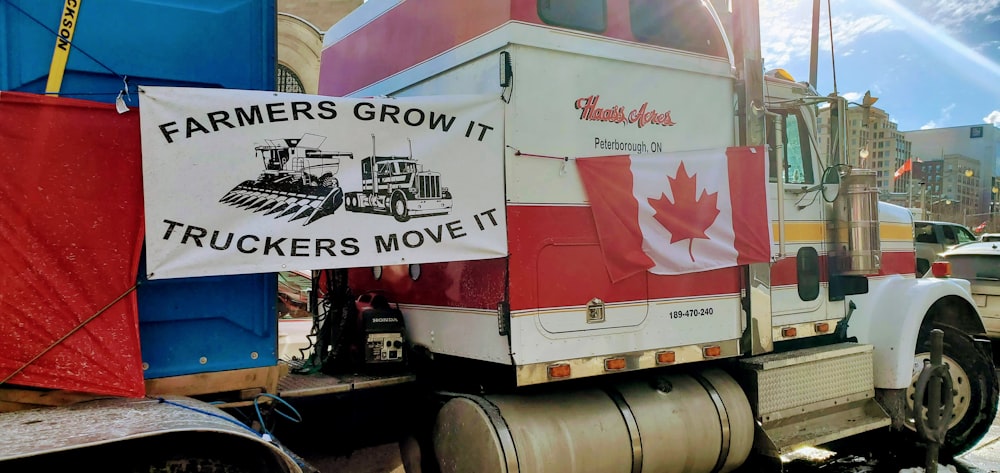 a truck with a canadian flag on the back of it