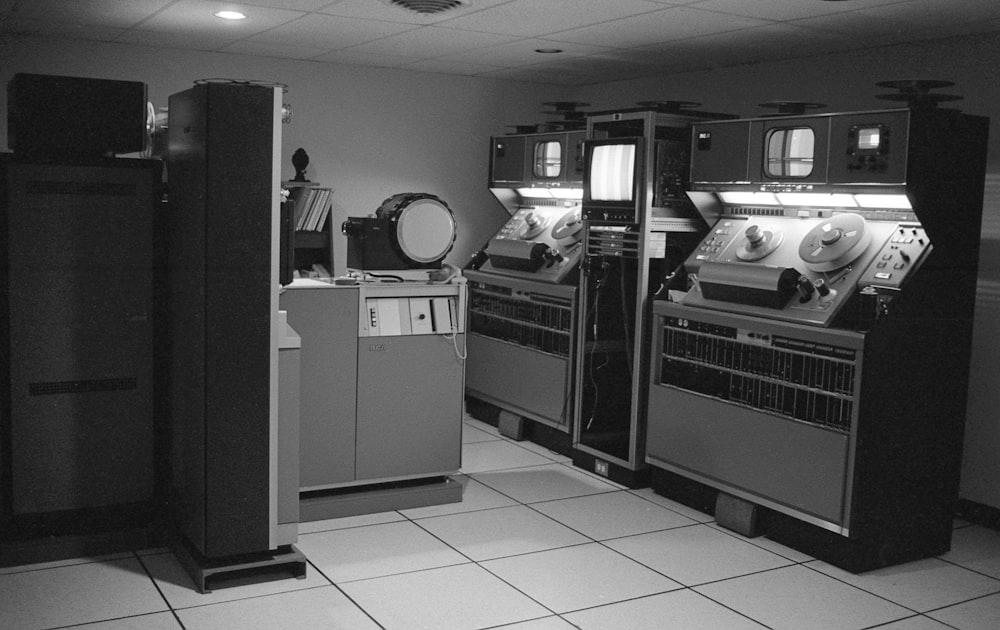 a black and white photo of a control room