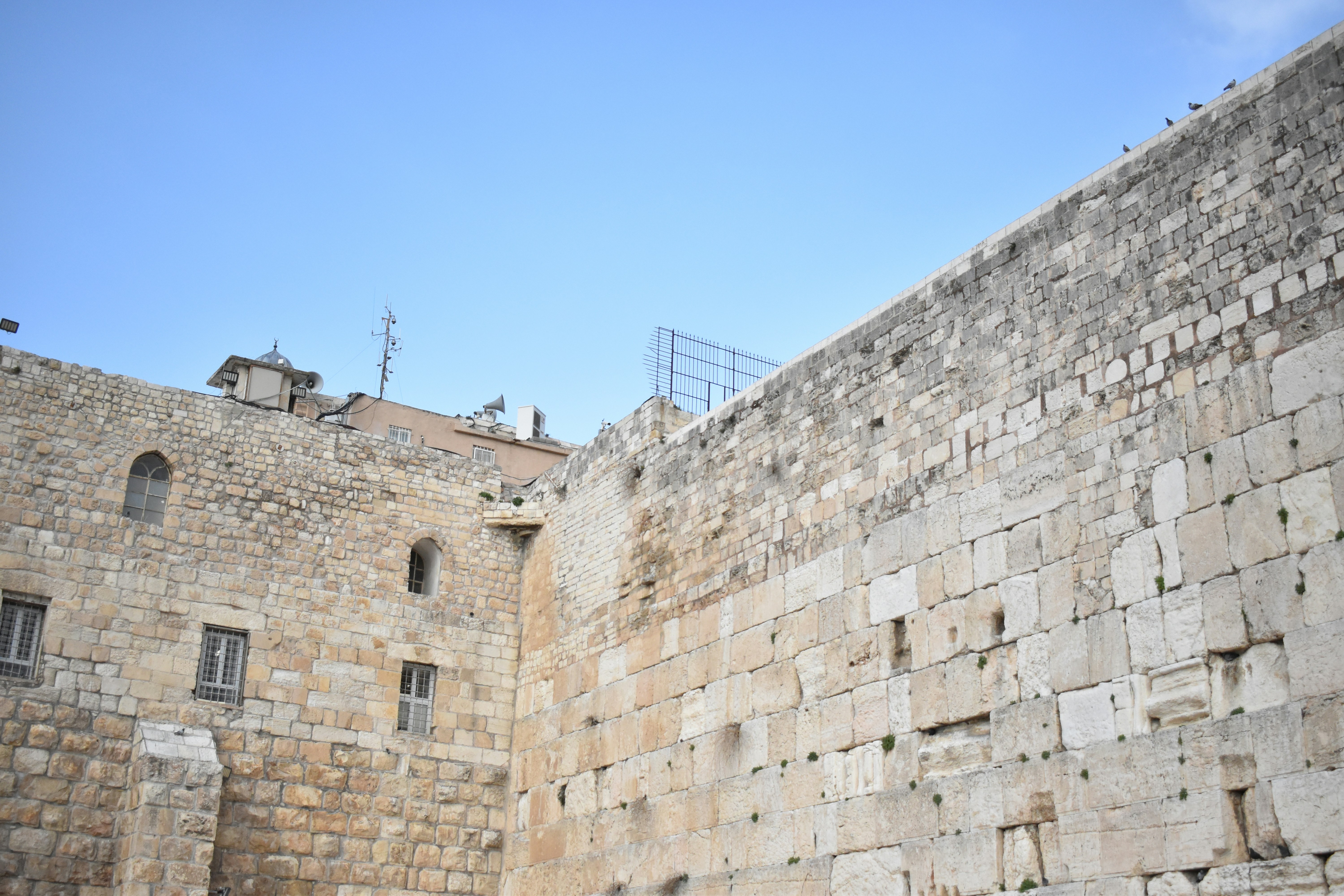 Western Wall stone details with clock