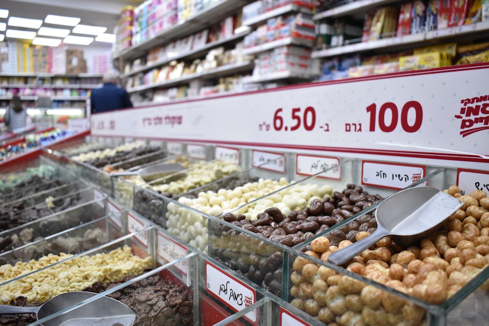 a store filled with lots of different types of donuts