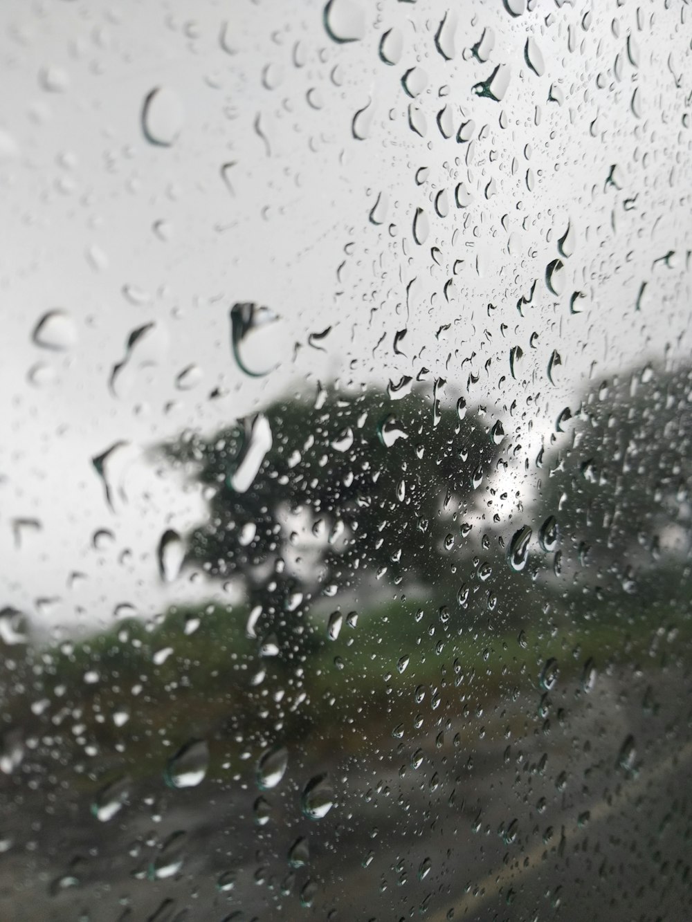 Rain drops on the window of a car on a rainy day photo – Free Rain ...