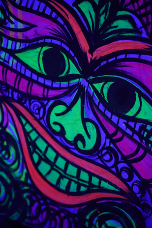 A vibrant caricature sketch of a smiling person with exaggerated features and bright colors.