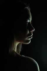 Side profile of a patient showing dramatic improvement after full rhinoplasty surgery.