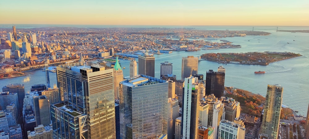 an aerial view of a city with a river in the background