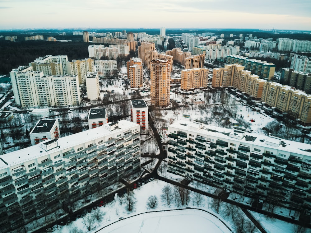 an aerial view of a city in winter