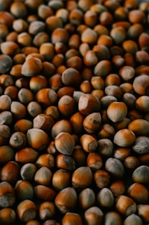a pile of nuts sitting on top of a table