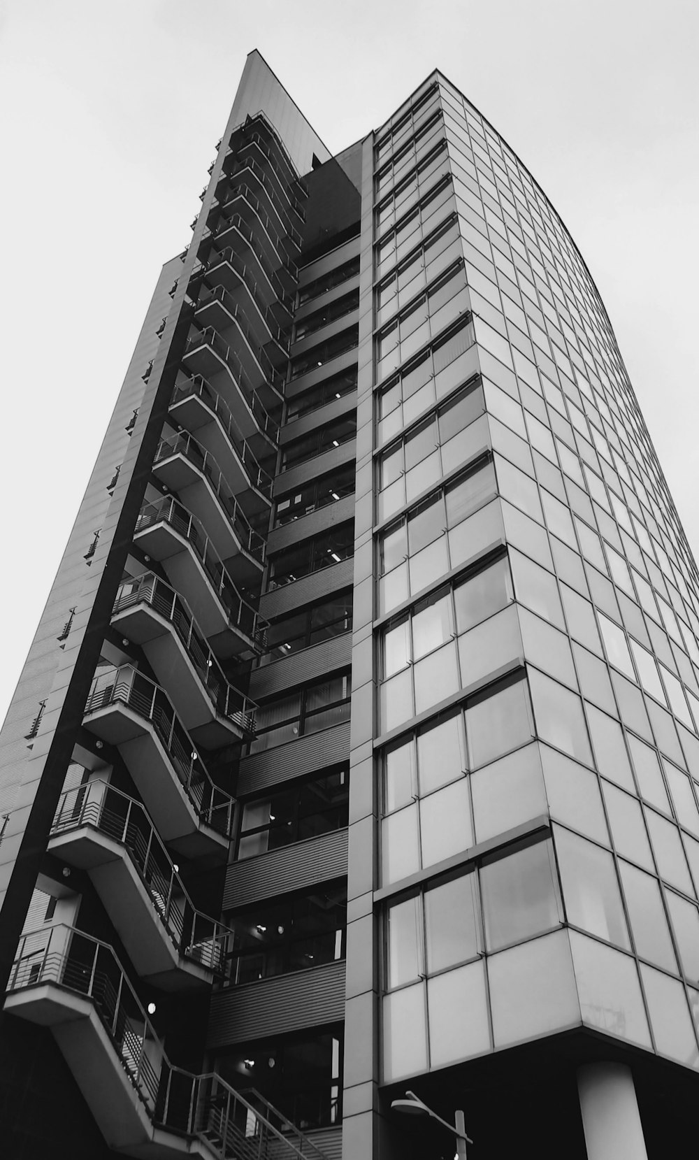 a black and white photo of a tall building