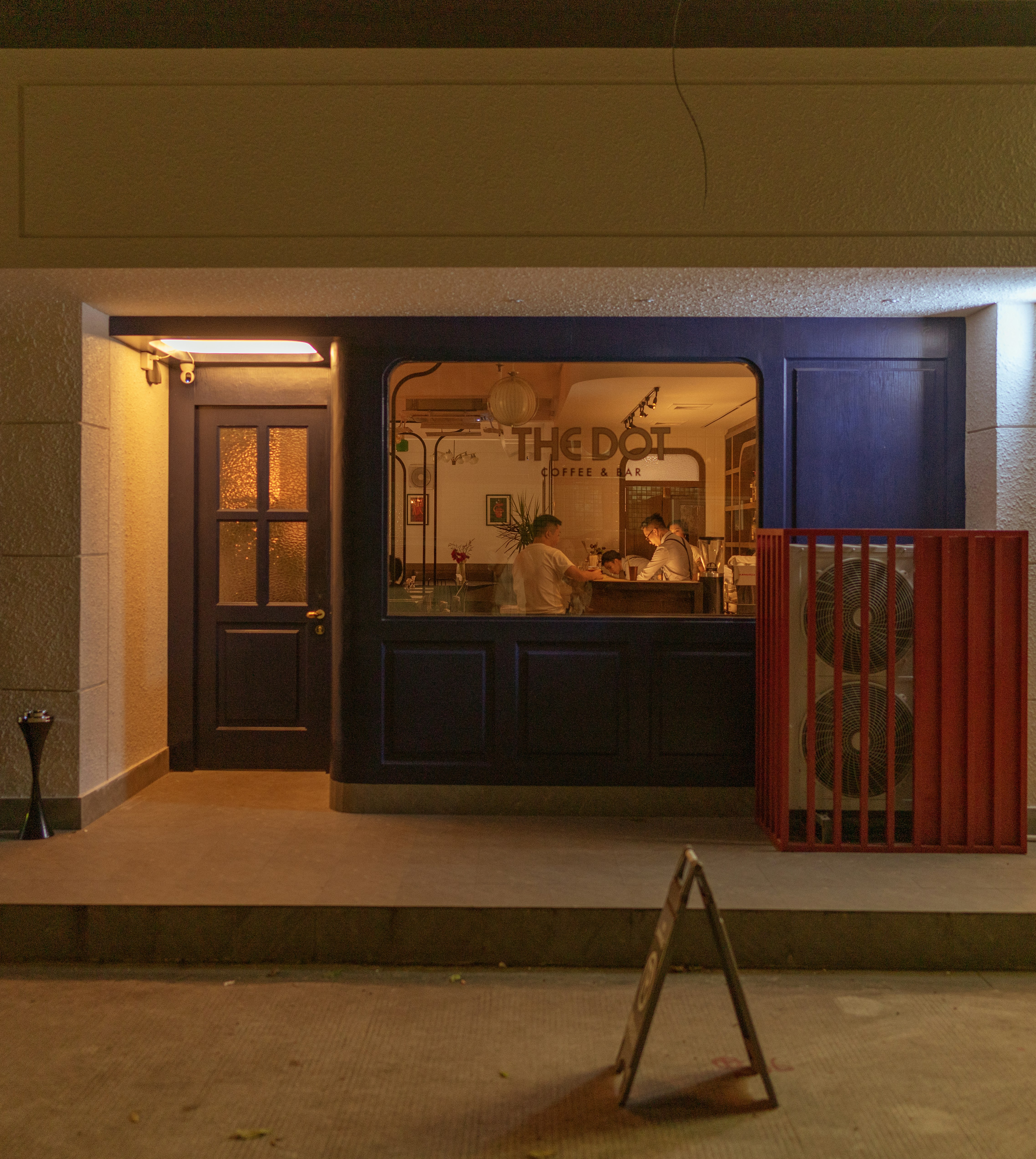 A restaurant with a blue door and a red gate photo – Free China Image ...