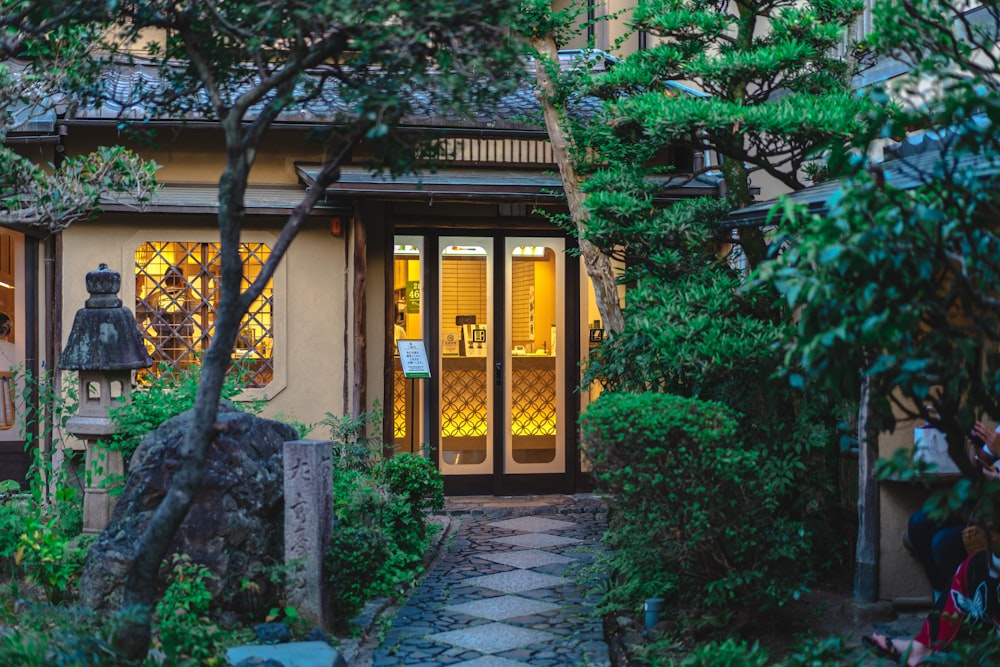 a building with a stone pathway leading to it