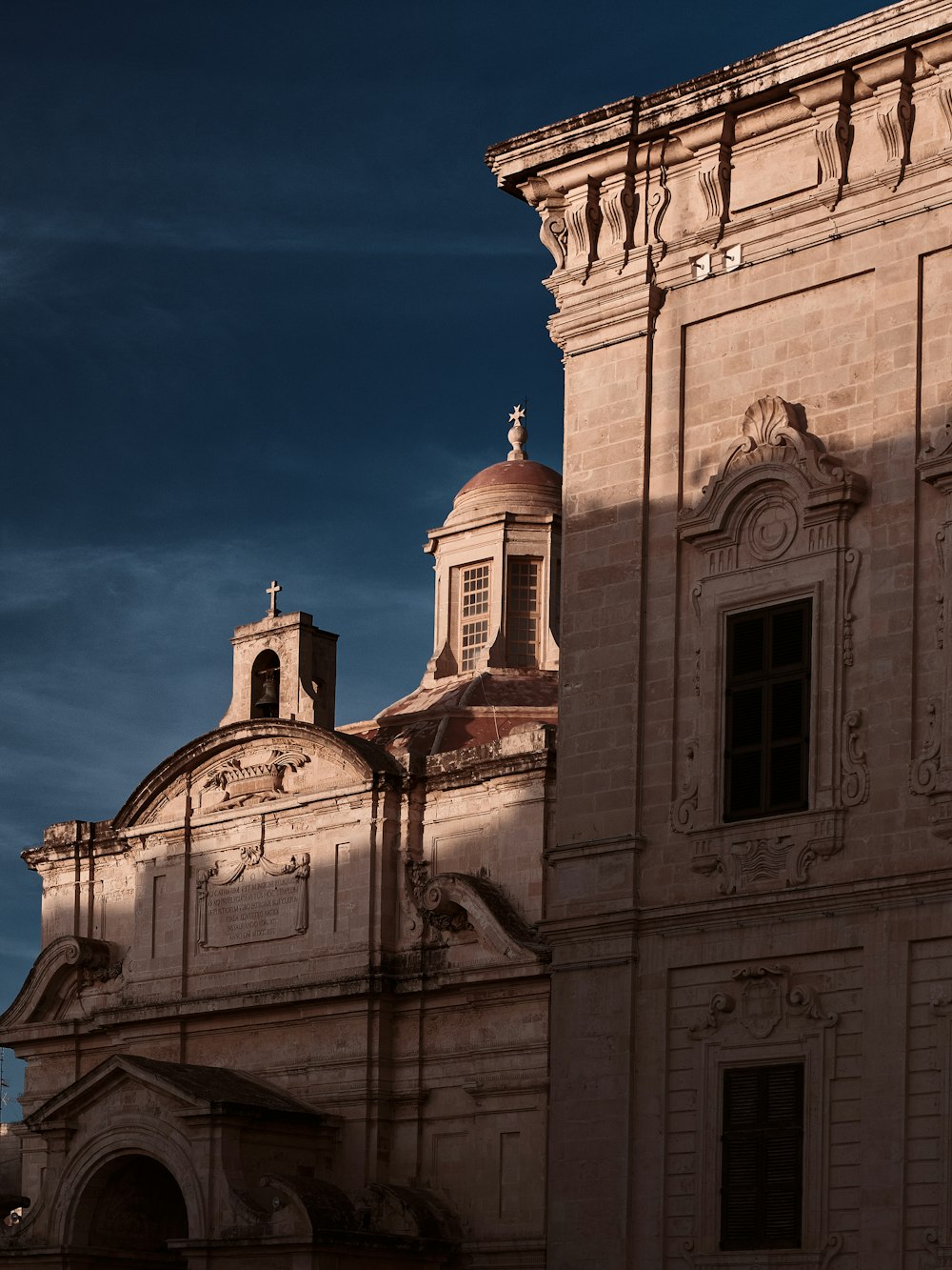 a large building with a clock on the front of it