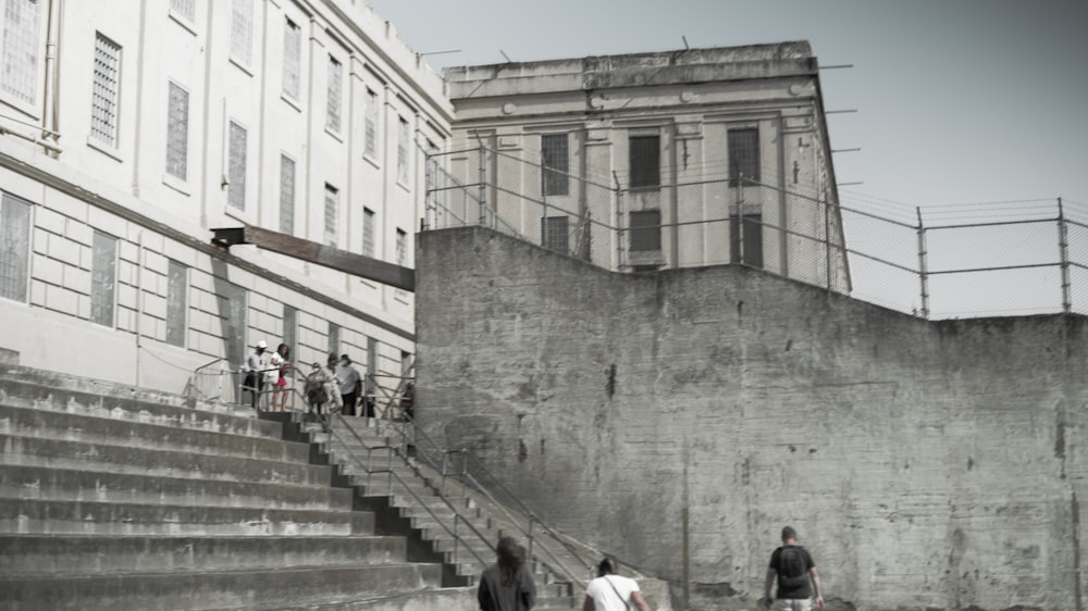 a man riding a skateboard down a set of stairs