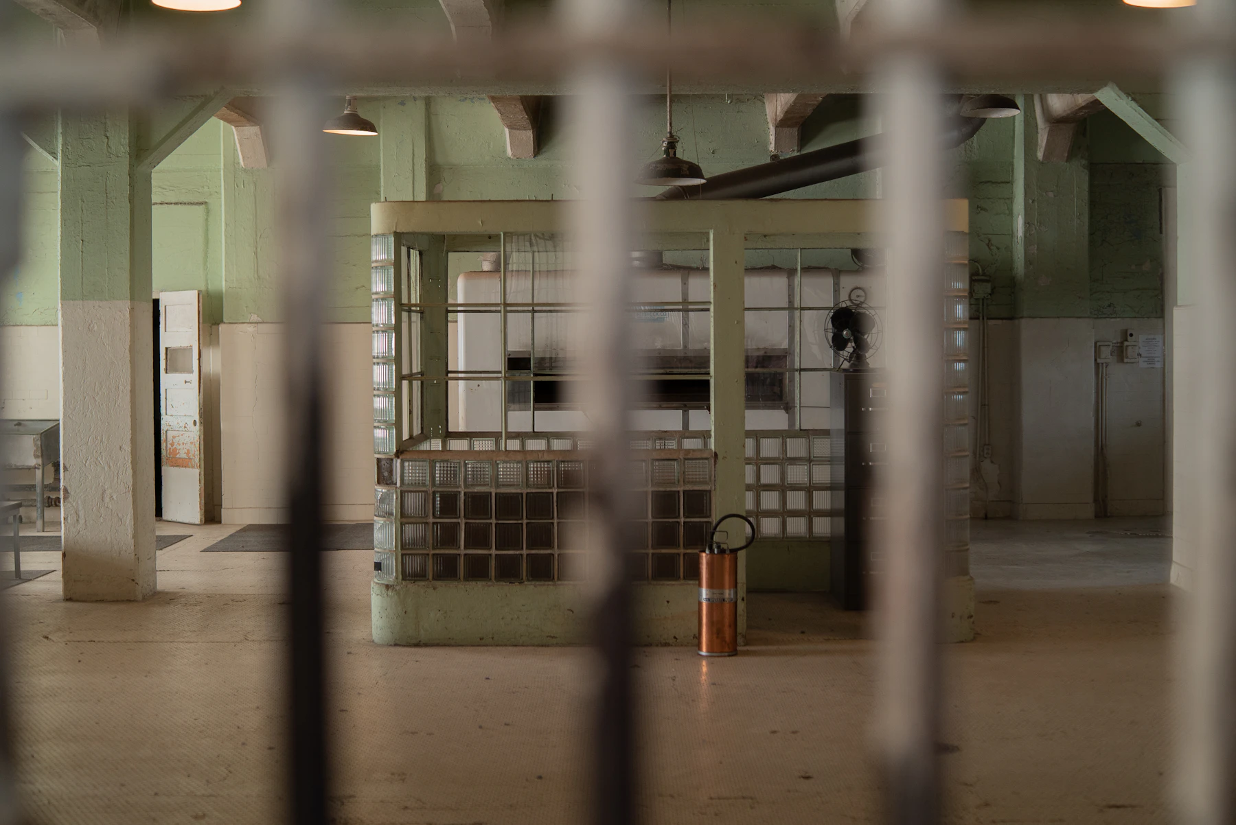 An Institutional Prison Interior Seen Through Bars