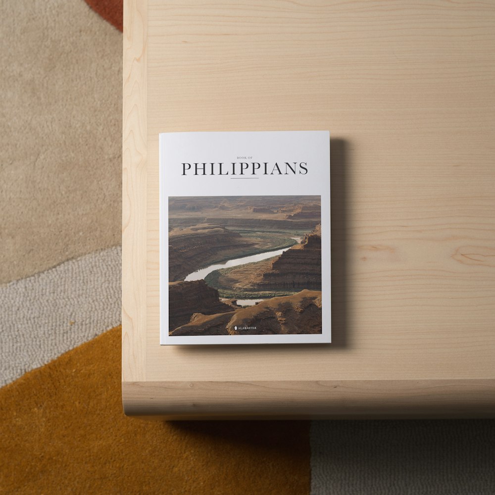 a book sitting on top of a wooden table