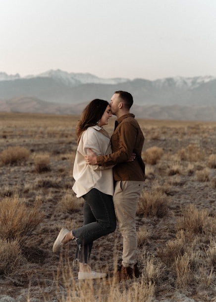 Romantic couple kissing and reconnecting through couples counseling in Colorado
