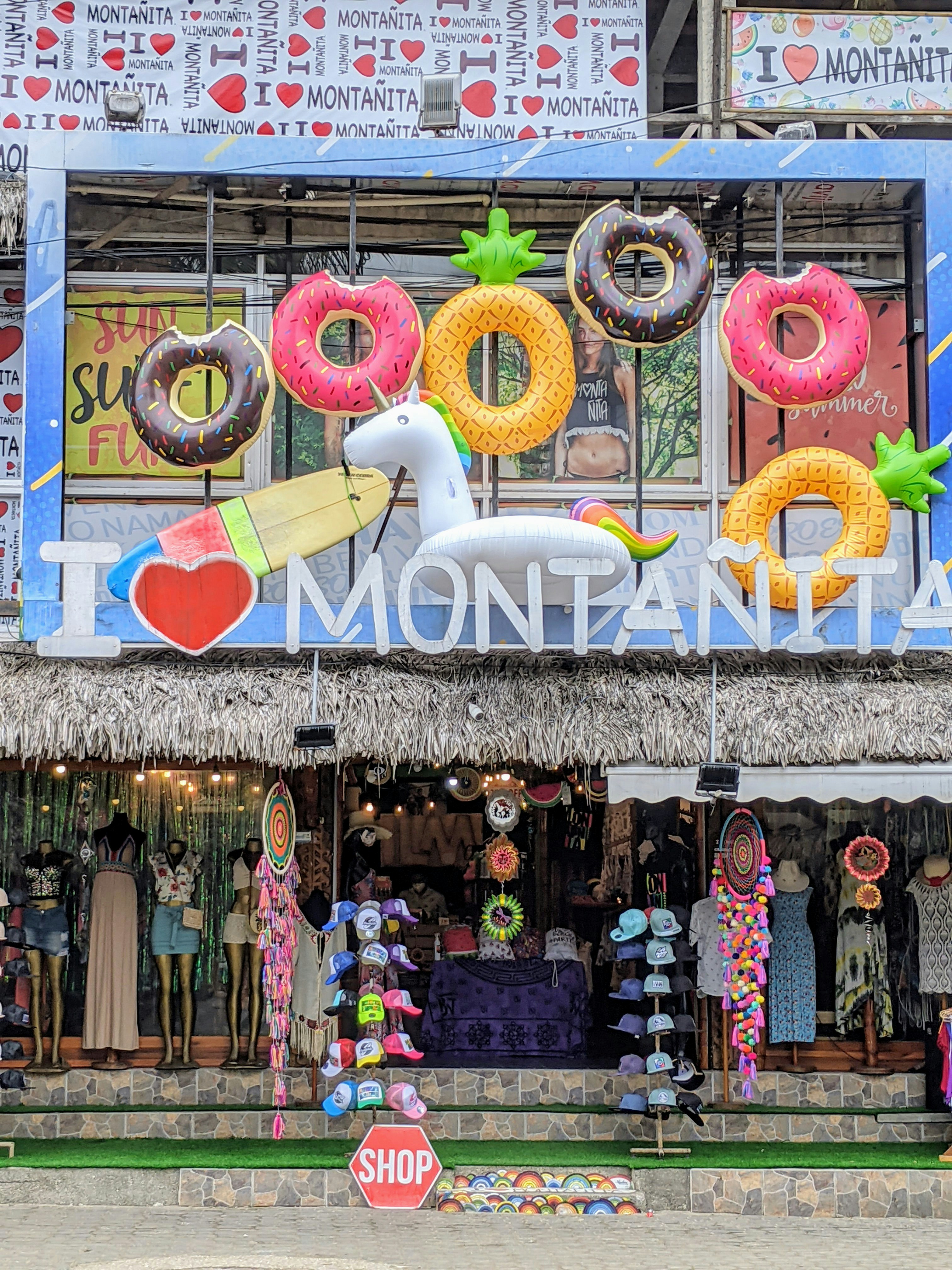 a store front with a sign that says donut shop