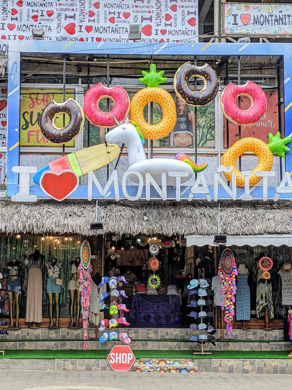 a store front with a sign that says donut shop