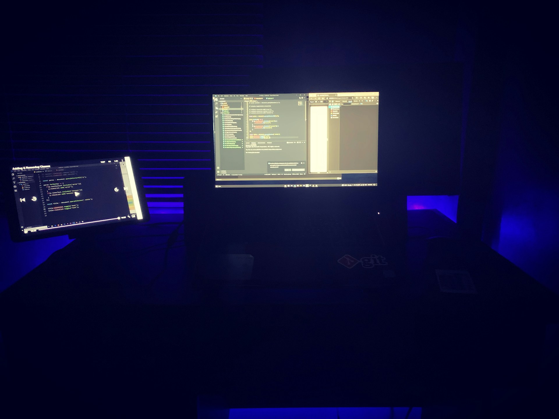 a computer monitor sitting on top of a desk