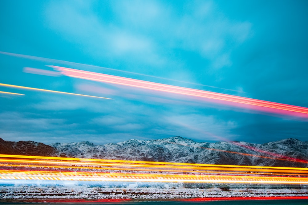 a long exposure photo of a mountain range