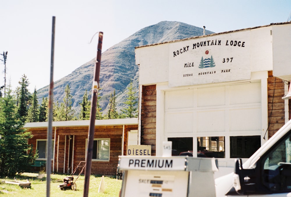 a white van parked in front of a building