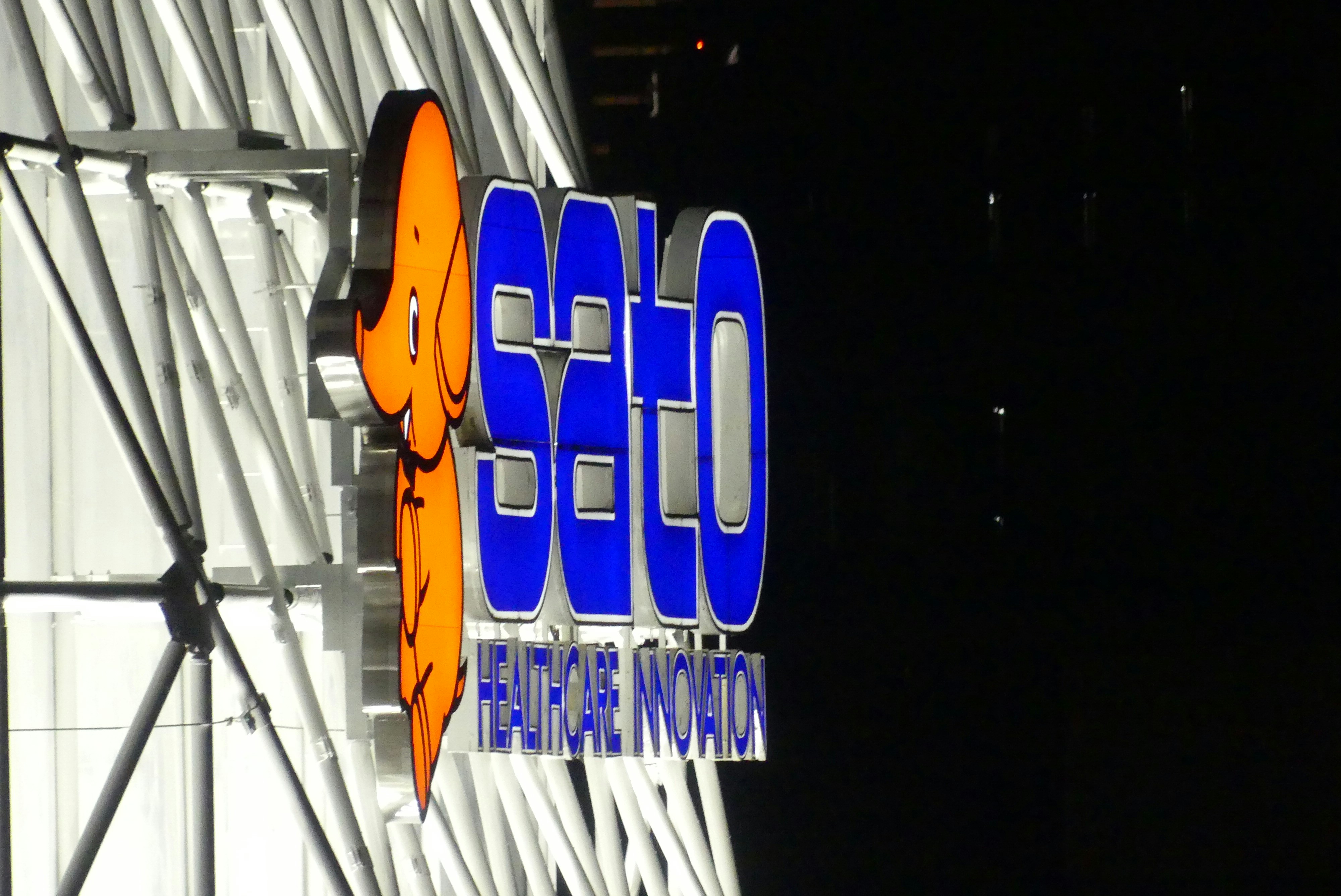 a close up of a sign on the side of a building