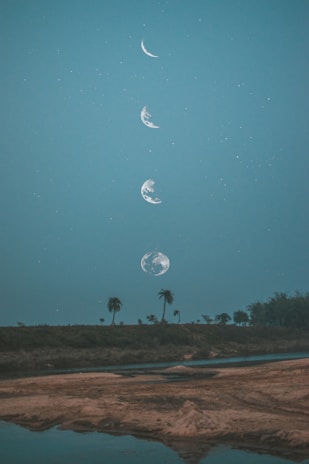 A serene night sky showing the moon phases, symbolizing the lunar basis of the Islamic calendar.