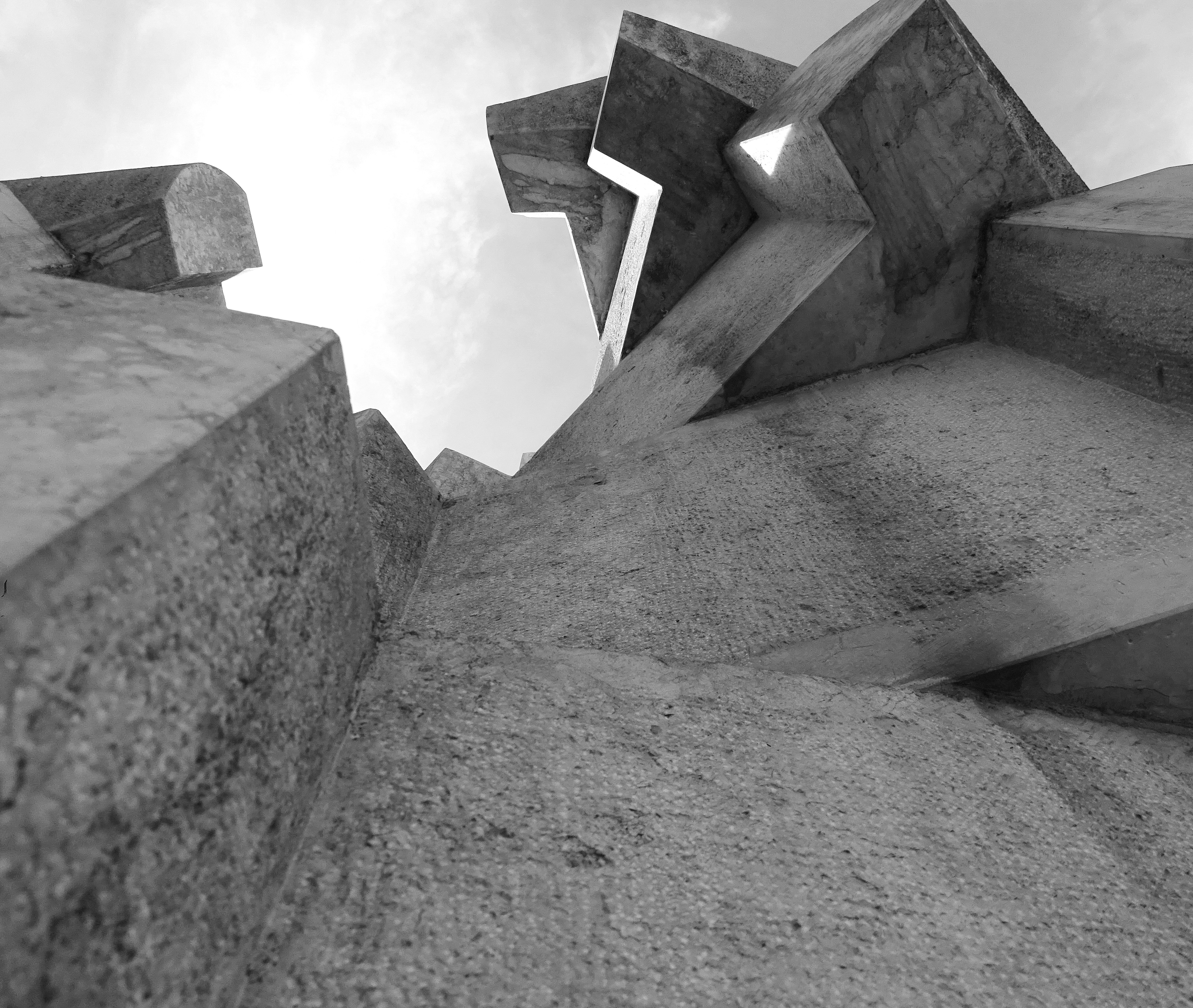 a black and white photo of a concrete structure