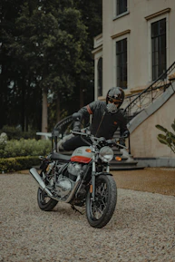 Close-up of a student practicing two-wheeler riding with safety gear in Koramangala.