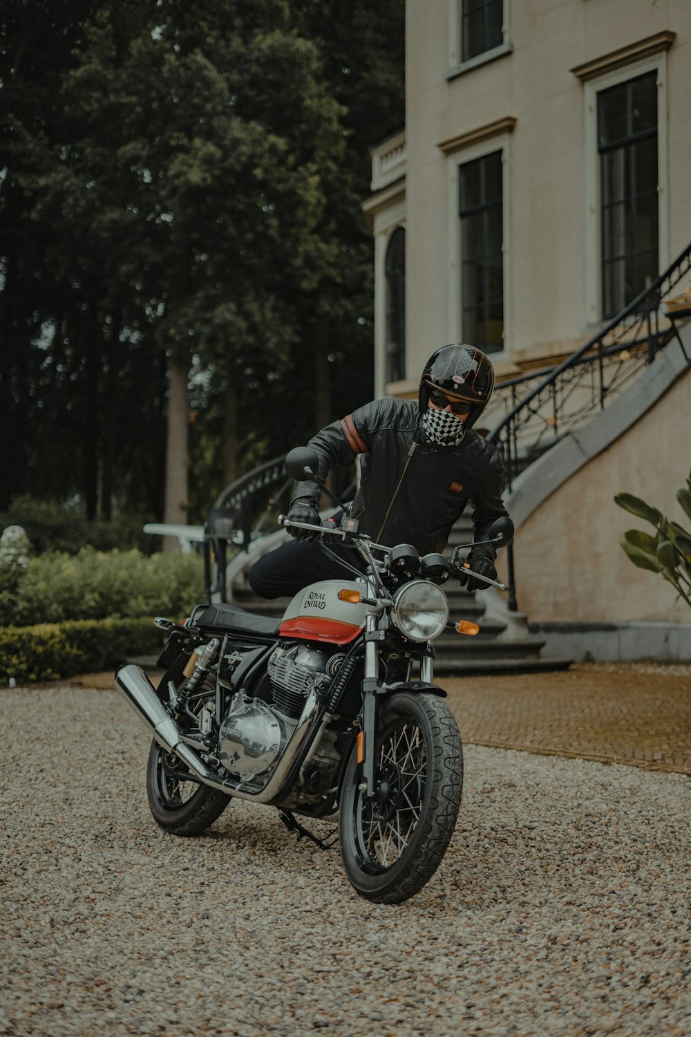 a man riding on the back of a motorcycle