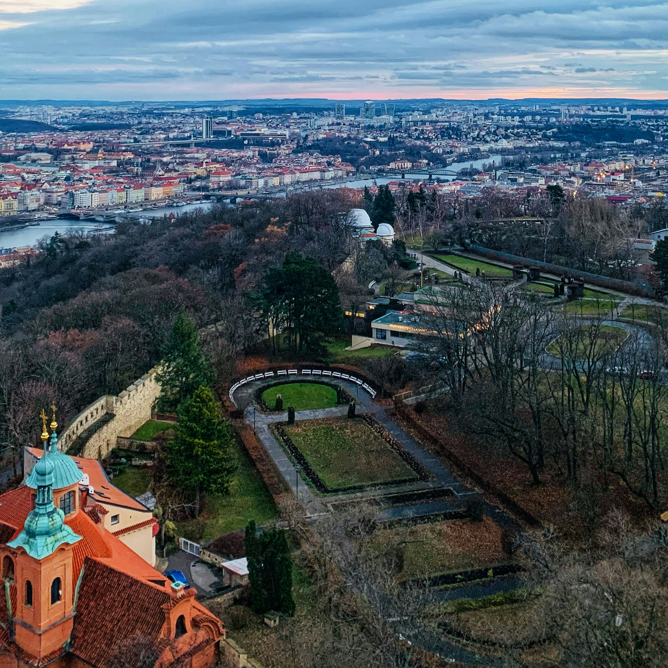 an aerial view of a city and a river