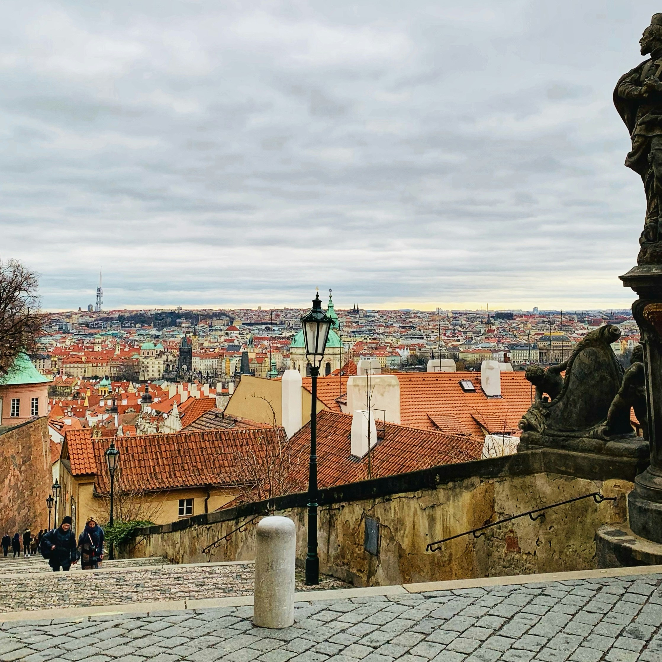 a view of a city from the top of a hill