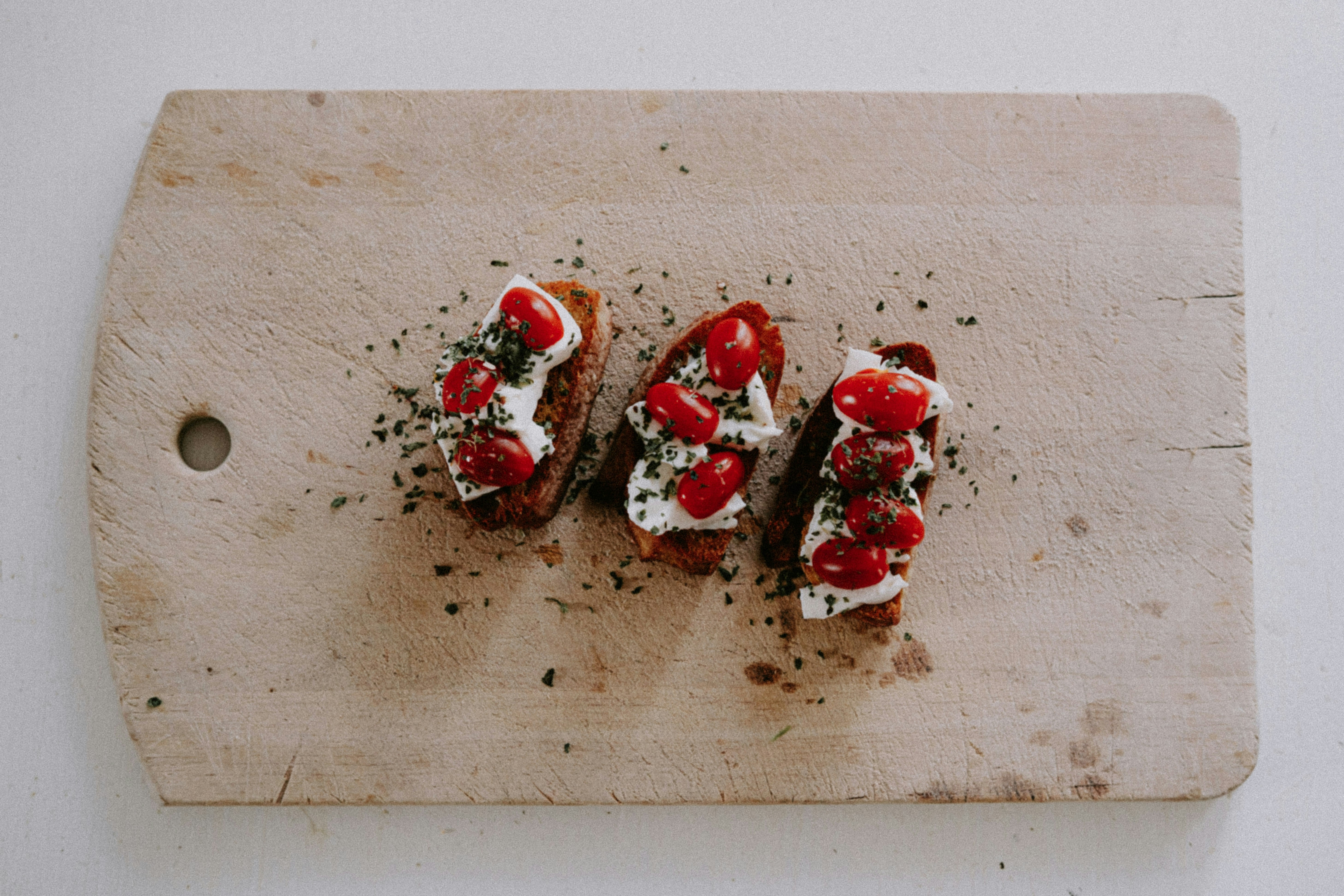 Small bruschetta on a cutting board