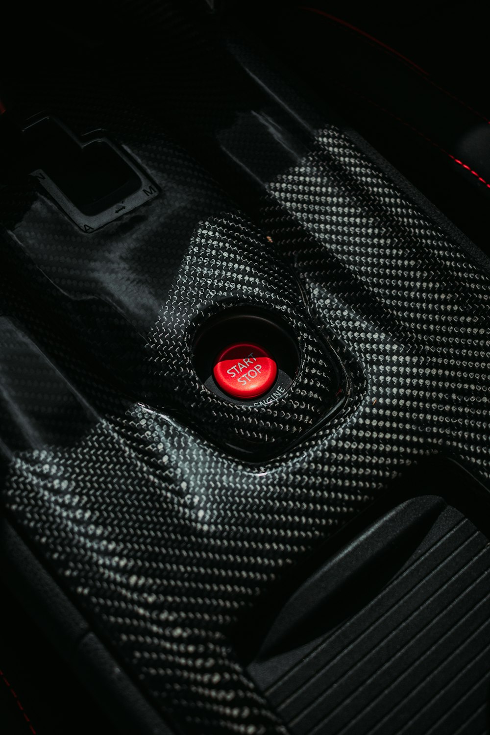 a close up of a red light in a car