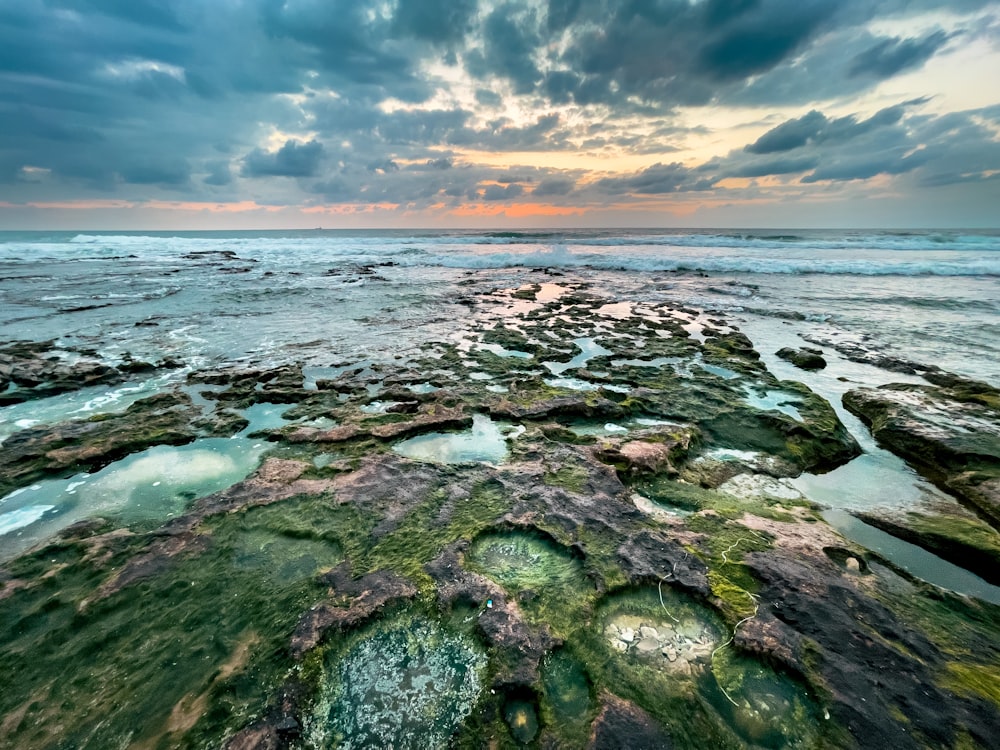 a large body of water surrounded by rocks