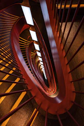 a close up of a spiral staircase in a building